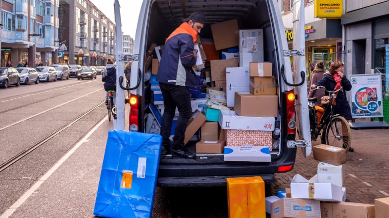 Amsterdam,,December,2017.,A,Courier,From,Postnl,Parcel,Delivery,Service