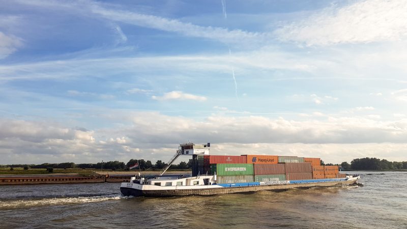 Binnenvaart,,Translation,,Inlandshipping,Container,Vessel,Transportation,Containers,Over,The,River